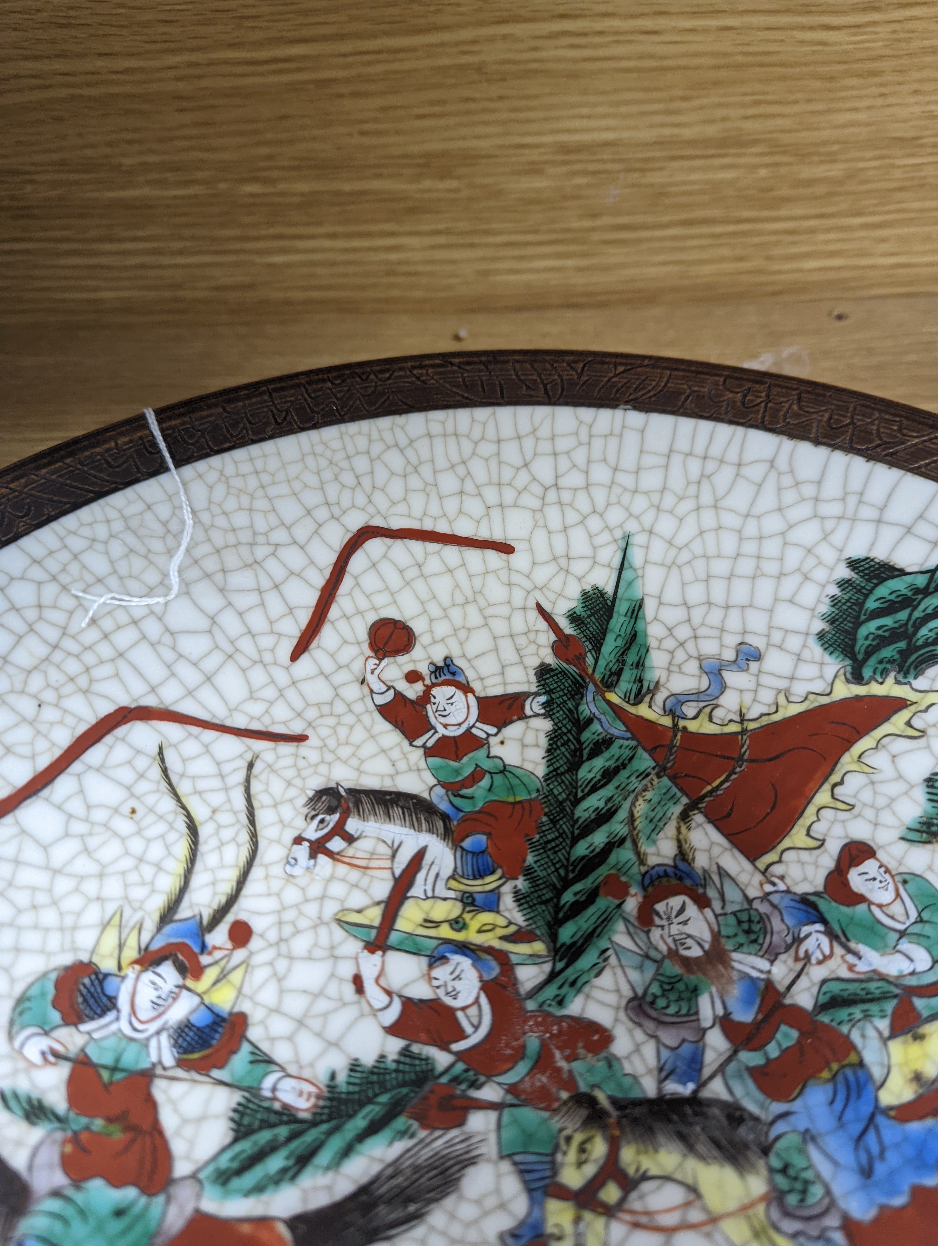 A Chinese famille verte 'warriors' crackle glaze dish 33cm